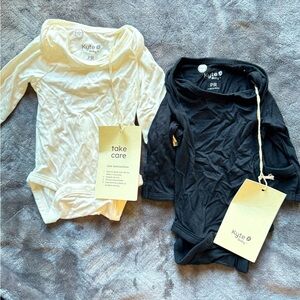 Preemie long sleeve kyte baby body suits. Never used. Slightly wrinkly.